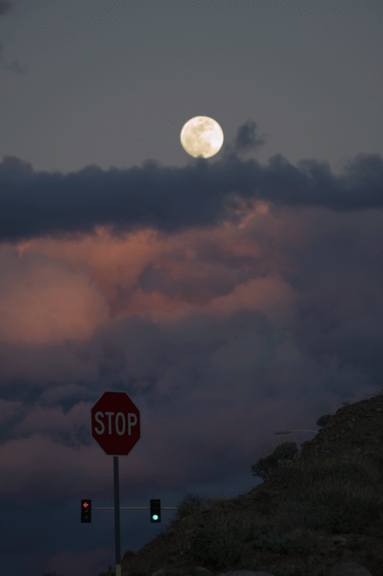Joe Dobrow photo of the moon and a stop sign